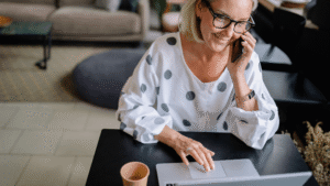 A successful business owner managing her online presence for Life In Motion Marketing